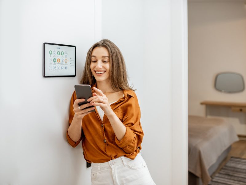 portrait-of-a-happy-woman-controlling-smart-home.jpg